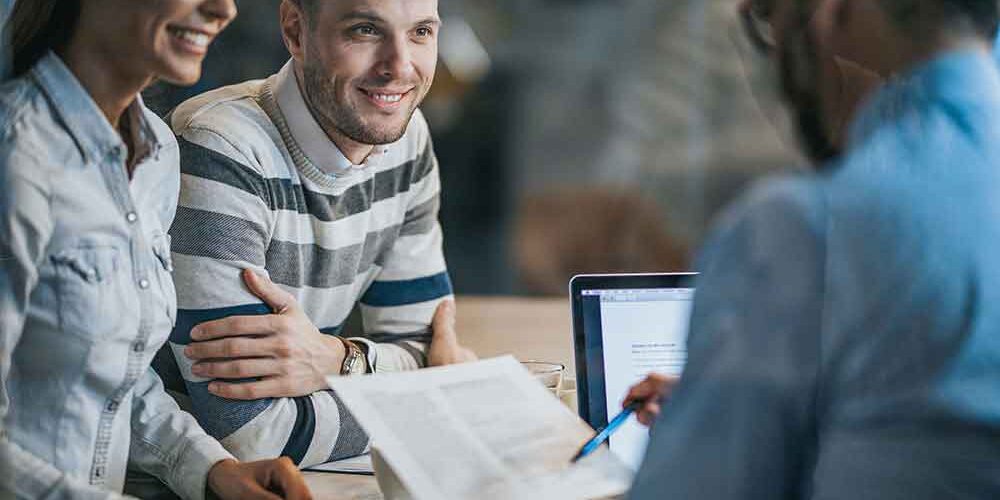 couple-talking-to-a-debt-advisor
