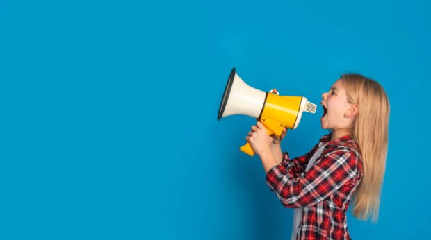 girl-megaphone-scaled