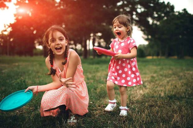 sisters-playing