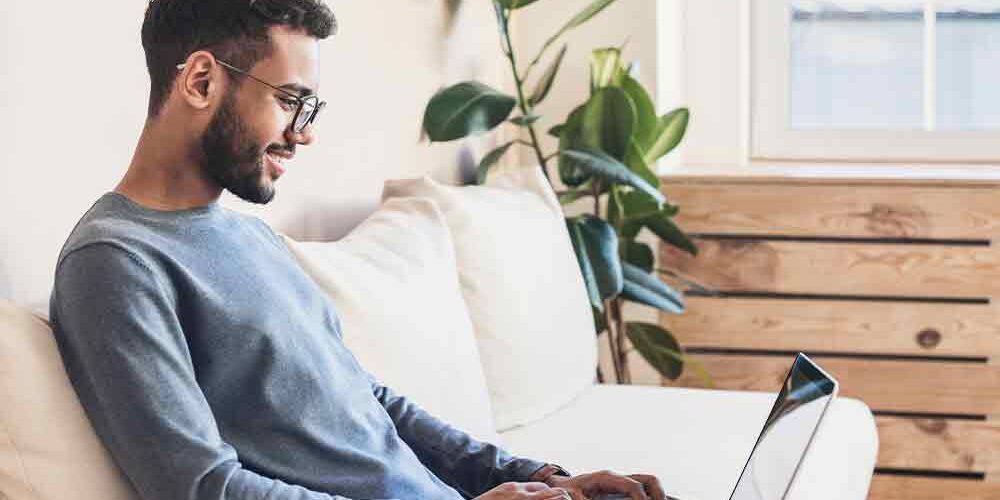 man-on-laptop-happy