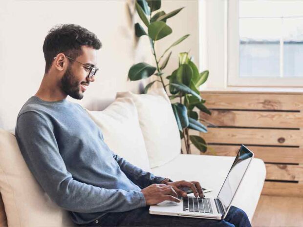 man-on-laptop-happy