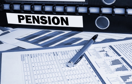 How to find lost pensions feature Image of a black folder with labelled "pension" with a couple of forms and a silver pen.