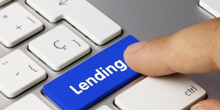What is irresponsible lending_ feature An image of someone pressing a 'lending' button on a keyboard