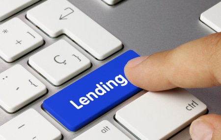What is irresponsible lending_ feature An image of someone pressing a 'lending' button on a keyboard