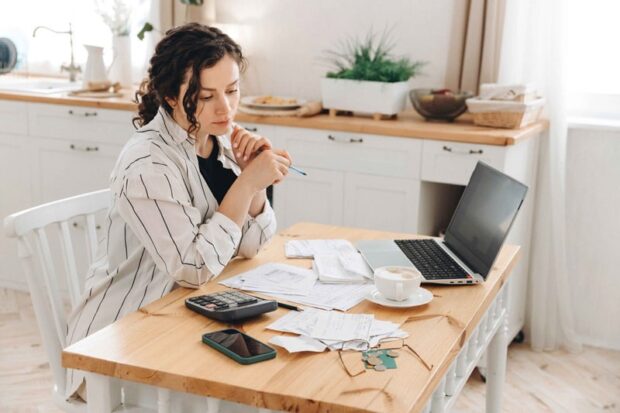 Woman reviewing her bills