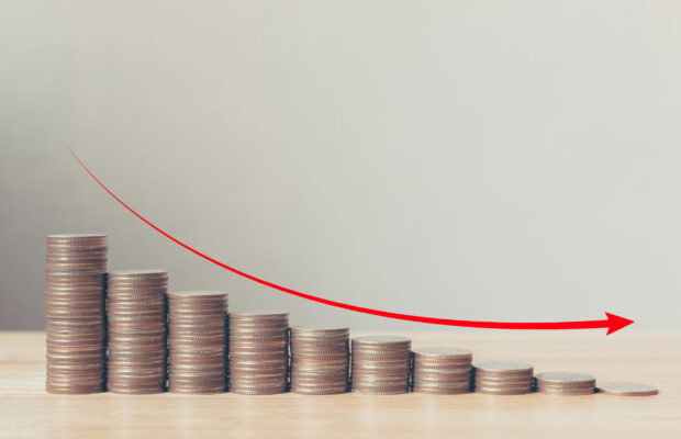 A stack of coins stepping down