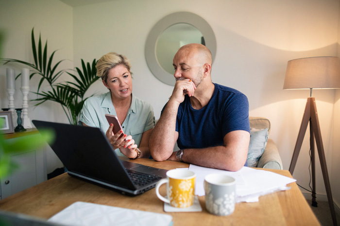 My partner doesn’t know I’m in debt. What should I do?